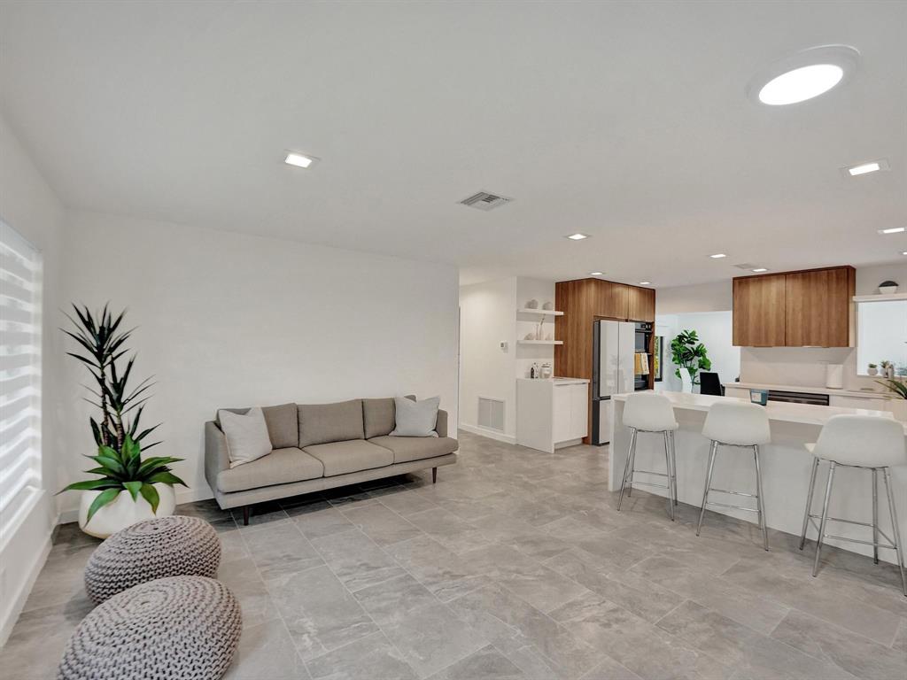 260 Northwest 36th Street Boca Raton, FL 33431 - Photo 31 of 35 a living room with furniture and a flat screen tv