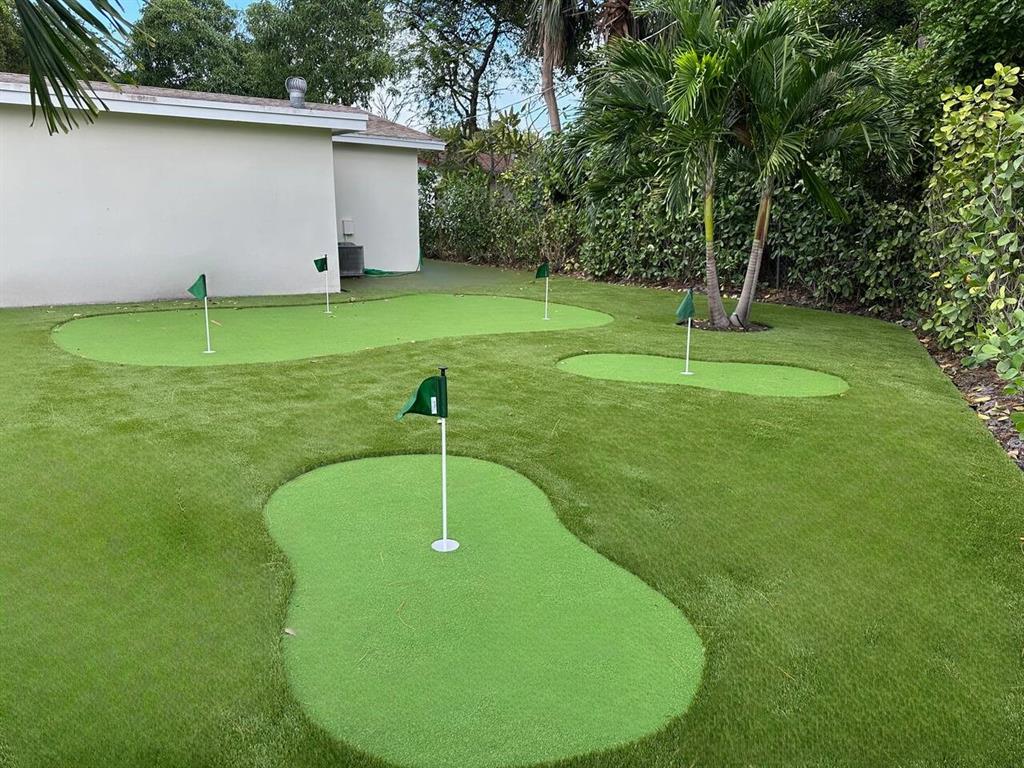 260 Northwest 36th Street Boca Raton, FL 33431 - Photo 4 of 35 a view of a backyard with a fountain