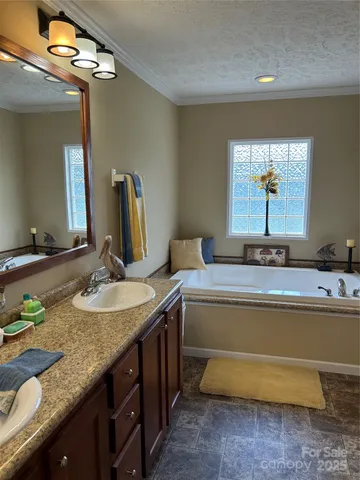 a living room with granite countertop furniture and a mirror