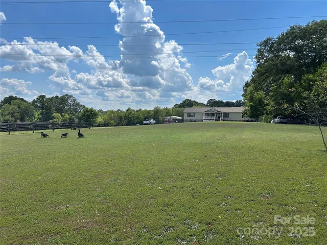 a view of a lake with a big yard