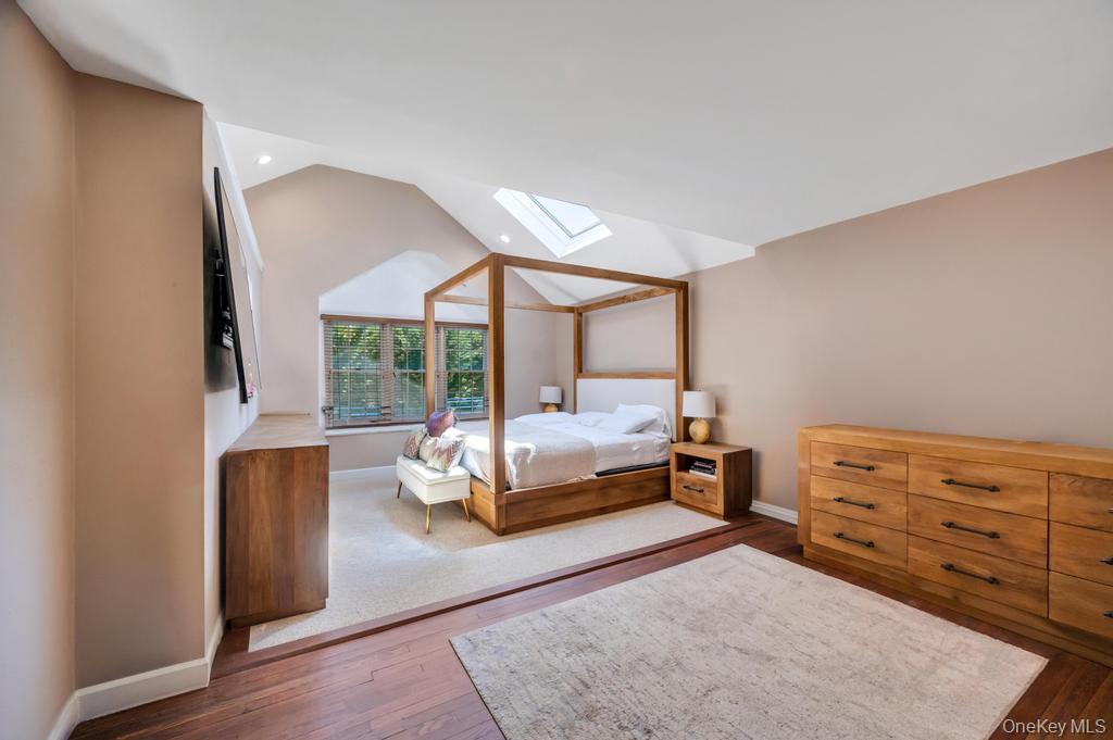 357 Wynsum Avenue Merrick, NY 11566 - Photo 30 of 40 a bedroom with a bed and large window