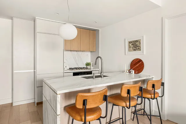 a living room with furniture and window