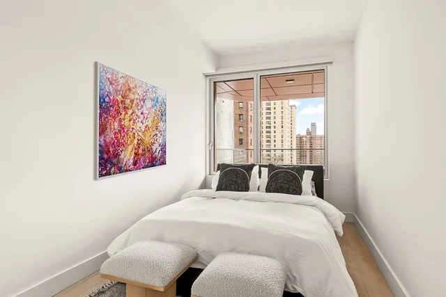 a kitchen with a sink cabinets and window