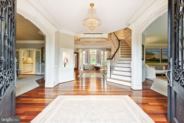 a view of a living room and staircase