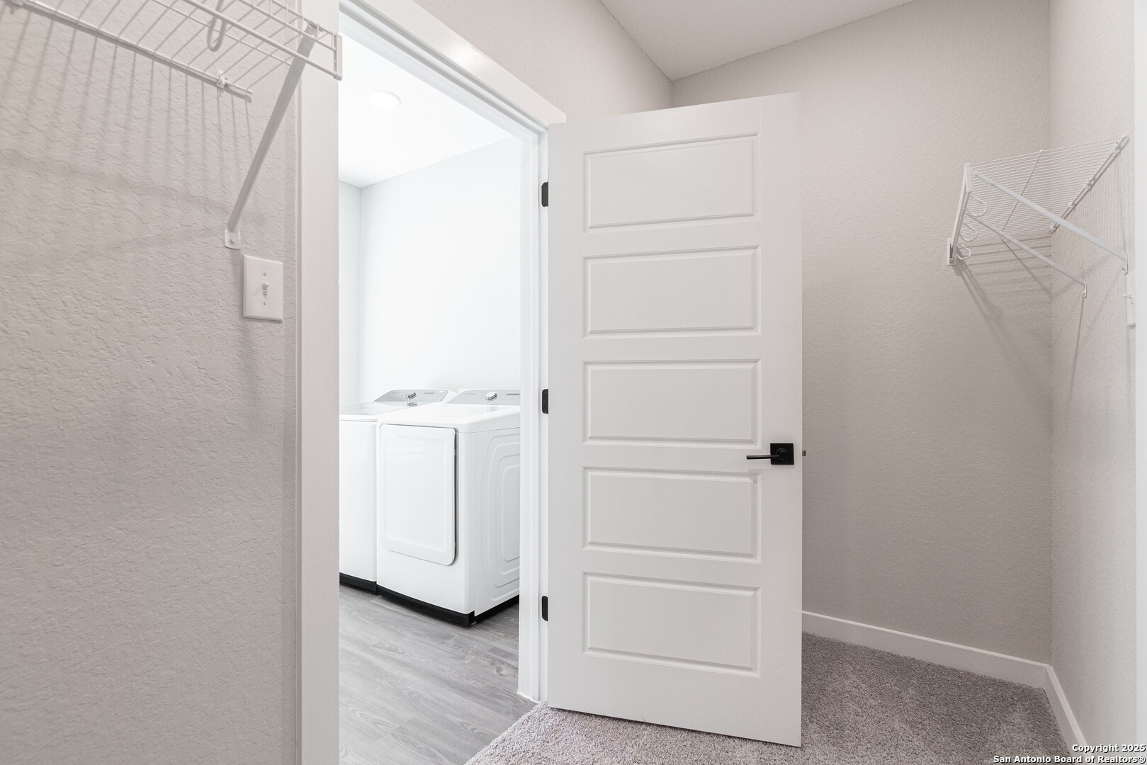 5815 Tree View Street San Antonio, TX 78220 - Photo 14 of 29 a view of walk in closet with empty racks