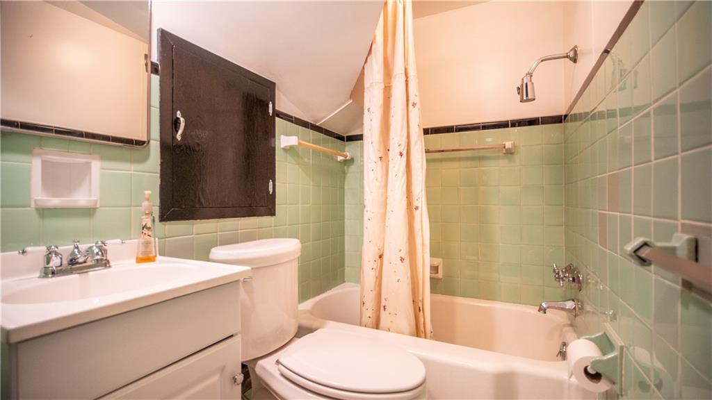 343 East 11th Avenue Tarentum, PA 15084 - Photo 27 of 41 a bathroom with a sink a toilet and shower