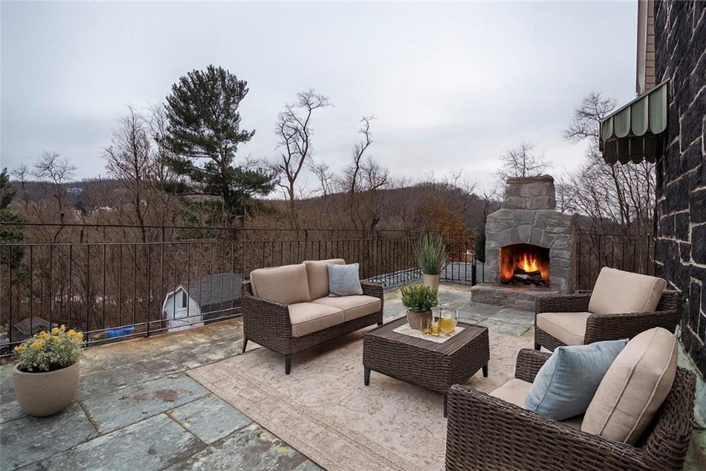 343 East 11th Avenue Tarentum, PA 15084 - Photo 31 of 41 a outdoor living space with furniture and a fireplace