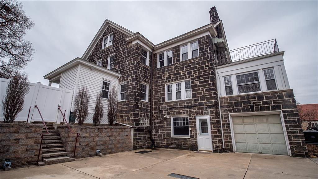 343 East 11th Avenue Tarentum, PA 15084 - Photo 9 of 41 a front view of a house with a garage