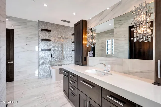 a view of swimming pool with lounge chair