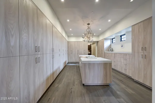 a view of a swimming pool with seating area