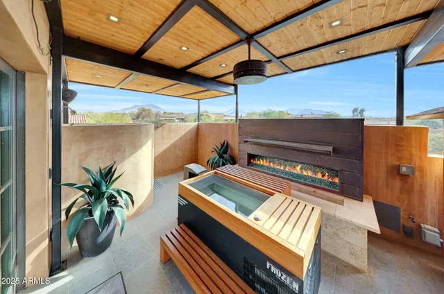 a kitchen with sink cabinets and wooden floor