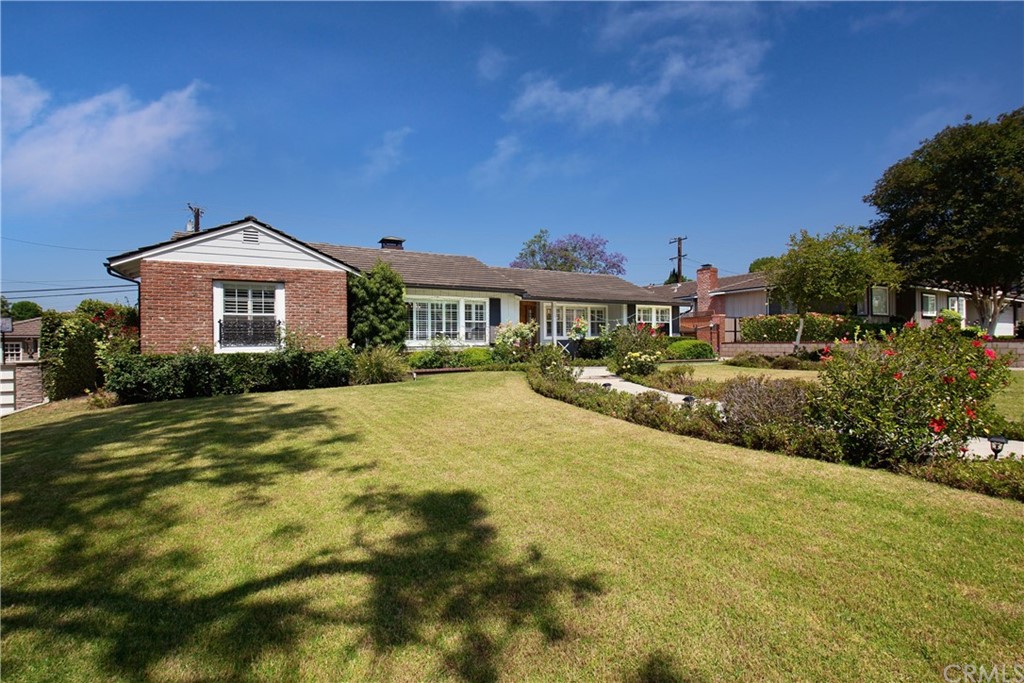 431 Monte Vista Road Arcadia, CA 91007 - Photo 2 of 30 a front view of a house with a yard and lake view
