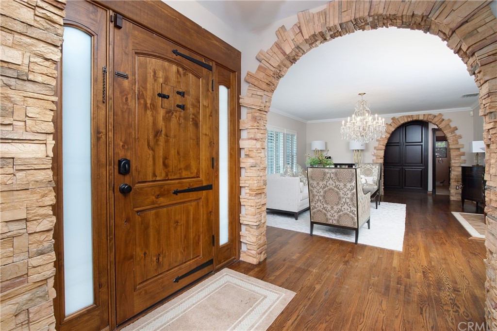 431 Monte Vista Road Arcadia, CA 91007 - Photo 5 of 30 a view of a hallway with wooden floor and glass door