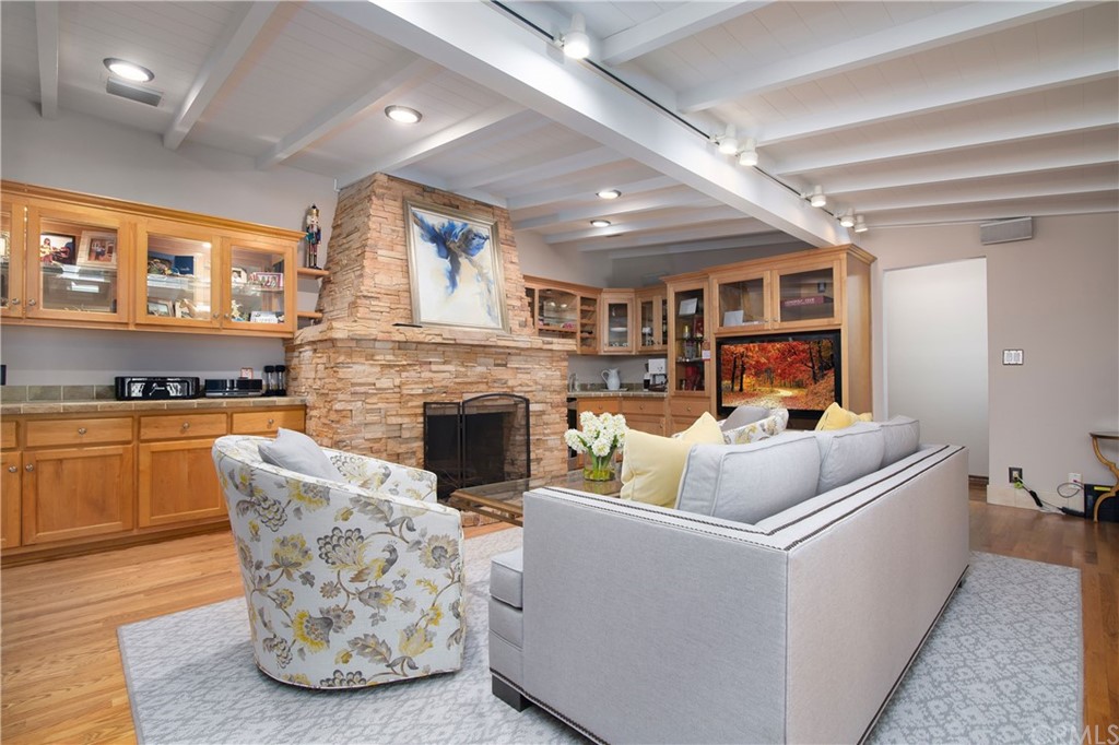 431 Monte Vista Road Arcadia, CA 91007 - Photo 7 of 30 a living room with furniture and a fireplace