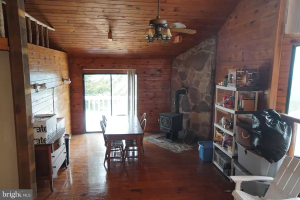 a view of a livingroom with furniture and window