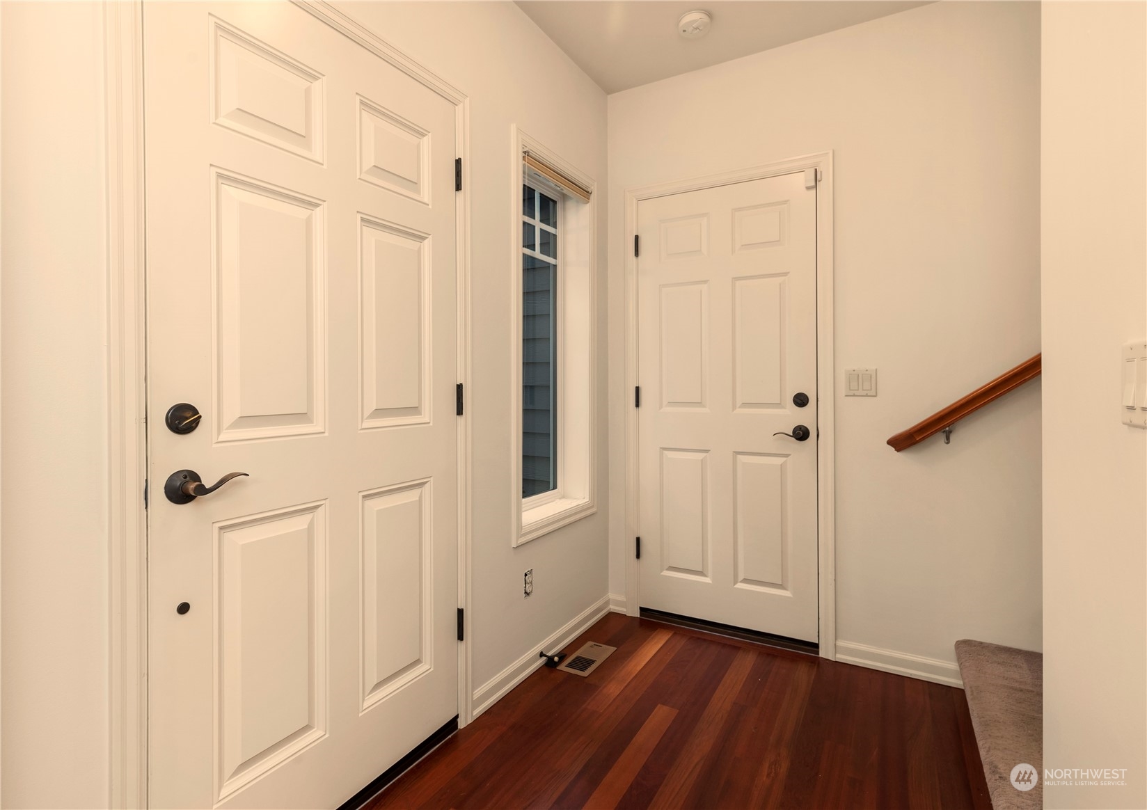 8507 Bowdoin Way, Unit 2 Edmonds, WA 98026 - Photo 12 of 24 a view of an entryway with wooden floor