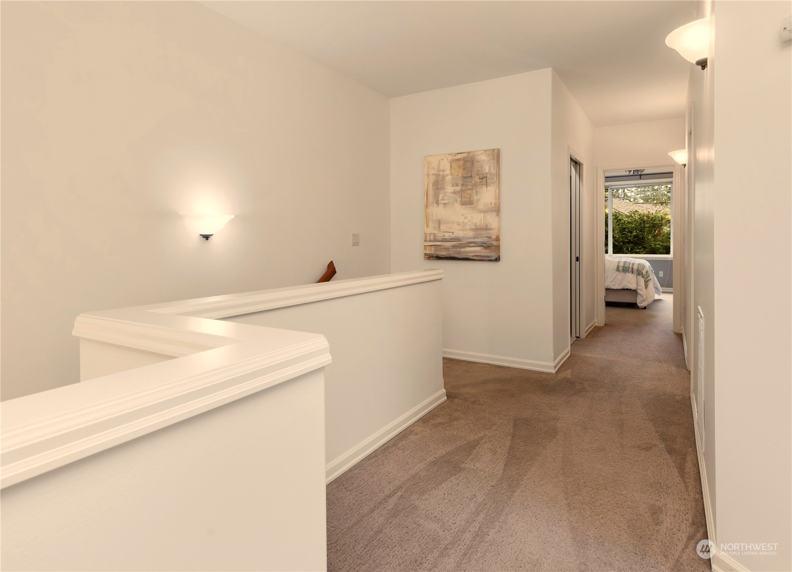 8507 Bowdoin Way, Unit 2 Edmonds, WA 98026 - Photo 13 of 24 a view of hallway with wooden floor