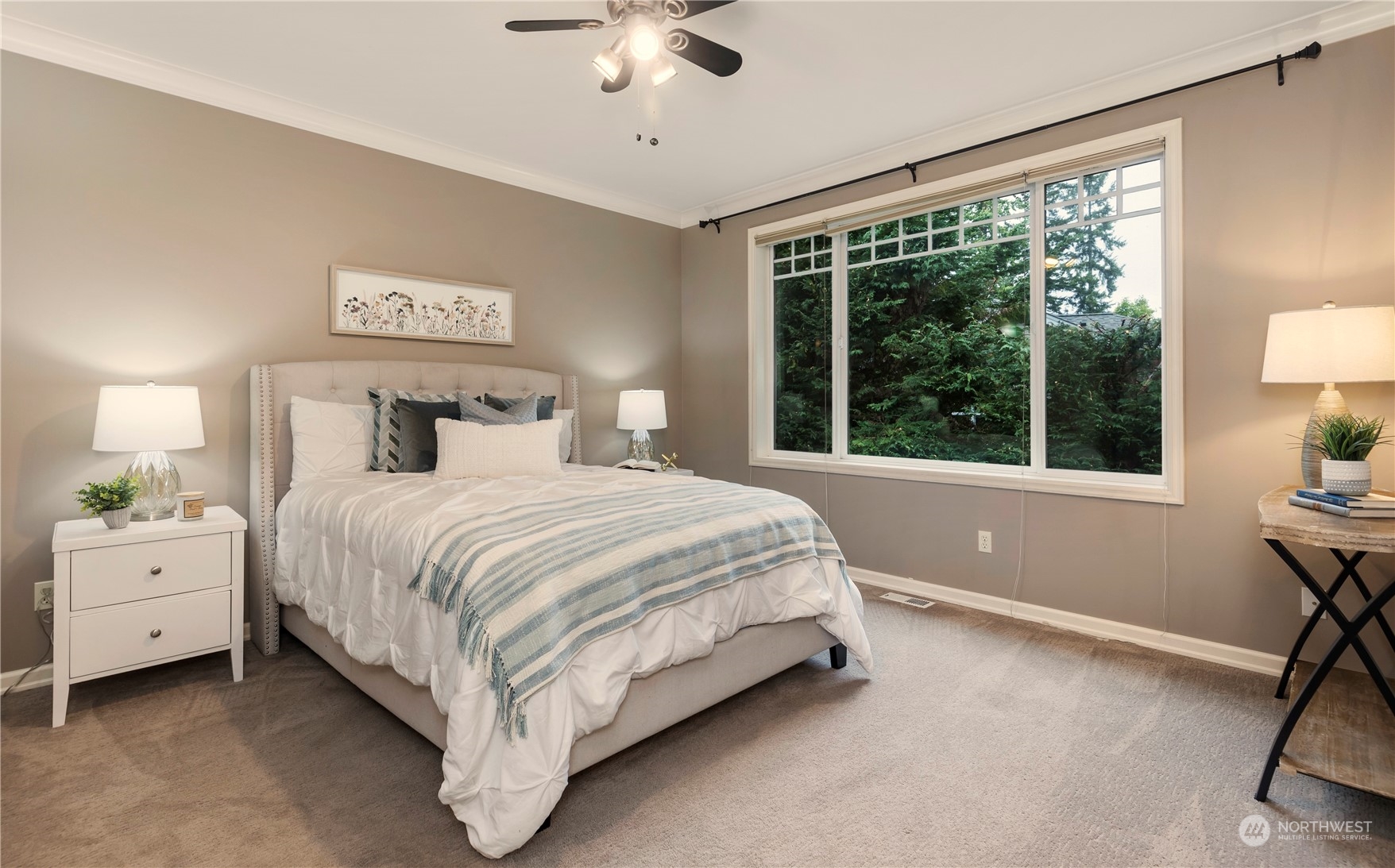 8507 Bowdoin Way, Unit 2 Edmonds, WA 98026 - Photo 15 of 24 a spacious bedroom with a large bed and a window