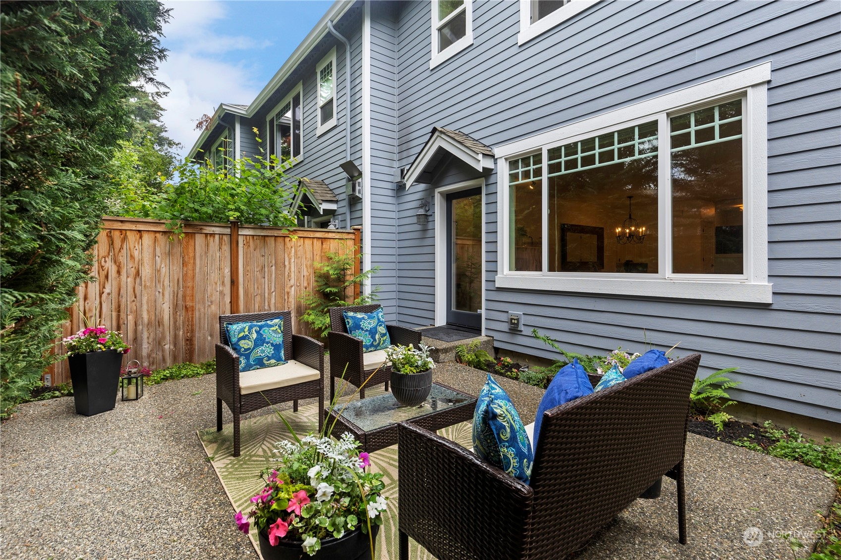 8507 Bowdoin Way, Unit 2 Edmonds, WA 98026 - Photo 22 of 24 a outdoor living space with patio furniture and potted plants
