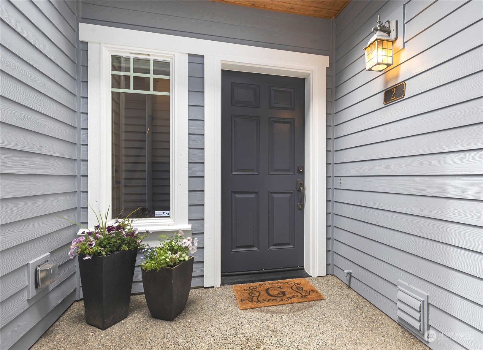 8507 Bowdoin Way, Unit 2 Edmonds, WA 98026 - Photo 4 of 24 a view of house with a potted plant