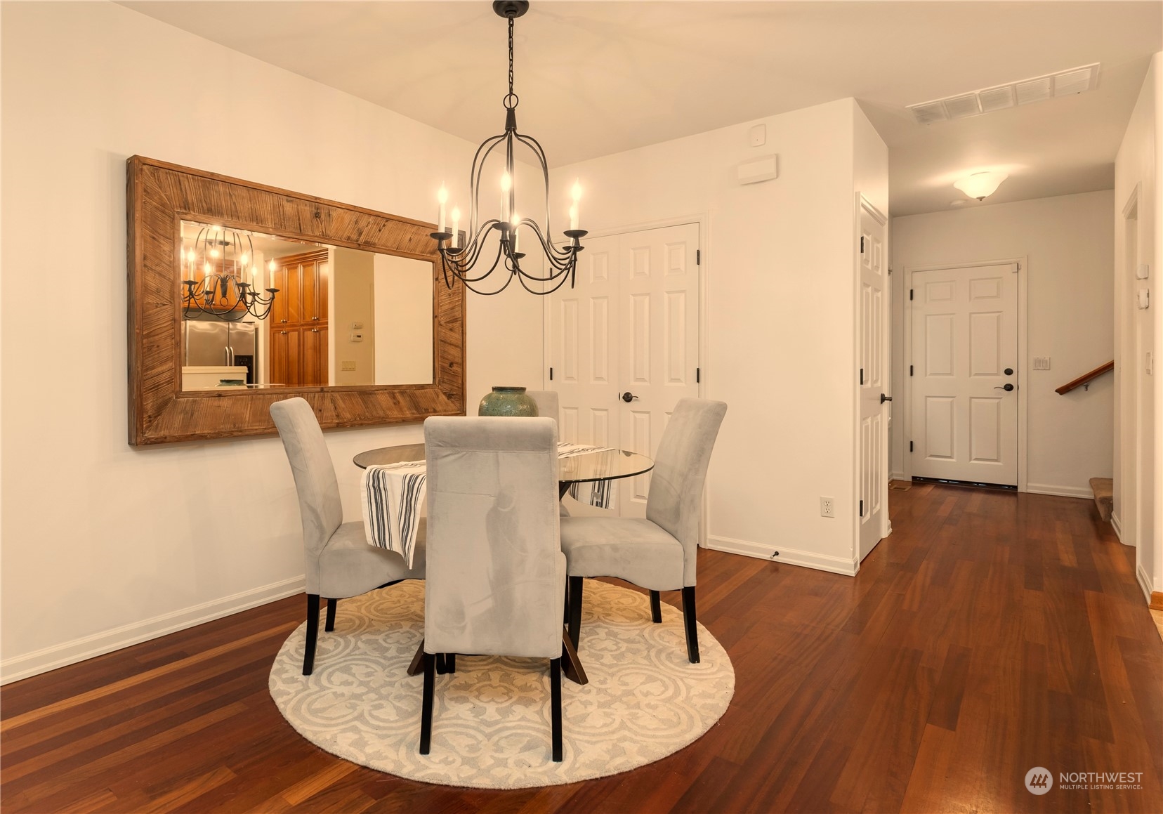 8507 Bowdoin Way, Unit 2 Edmonds, WA 98026 - Photo 8 of 24 a view of a dining room with furniture window and wooden floor