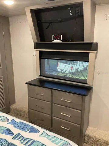 a view of fireplace and microwave