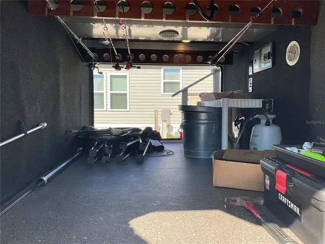 a room with furniture and a chandelier
