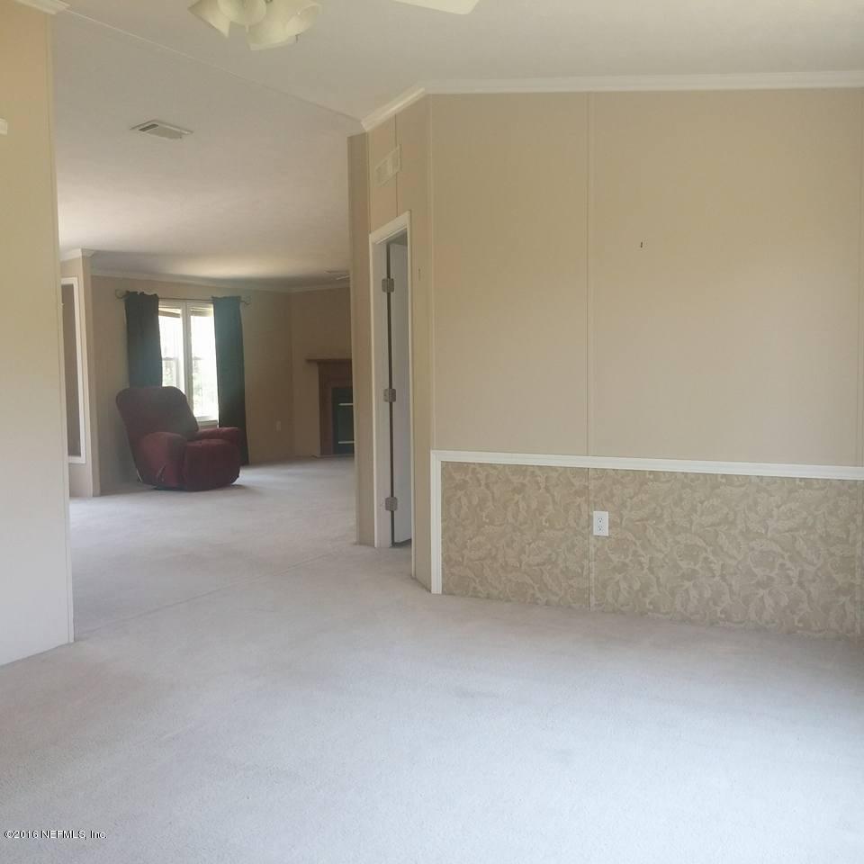 28749 Sundberg Road Hilliard, FL 32046 - Photo 11 of 38 ent fam rm to dining
