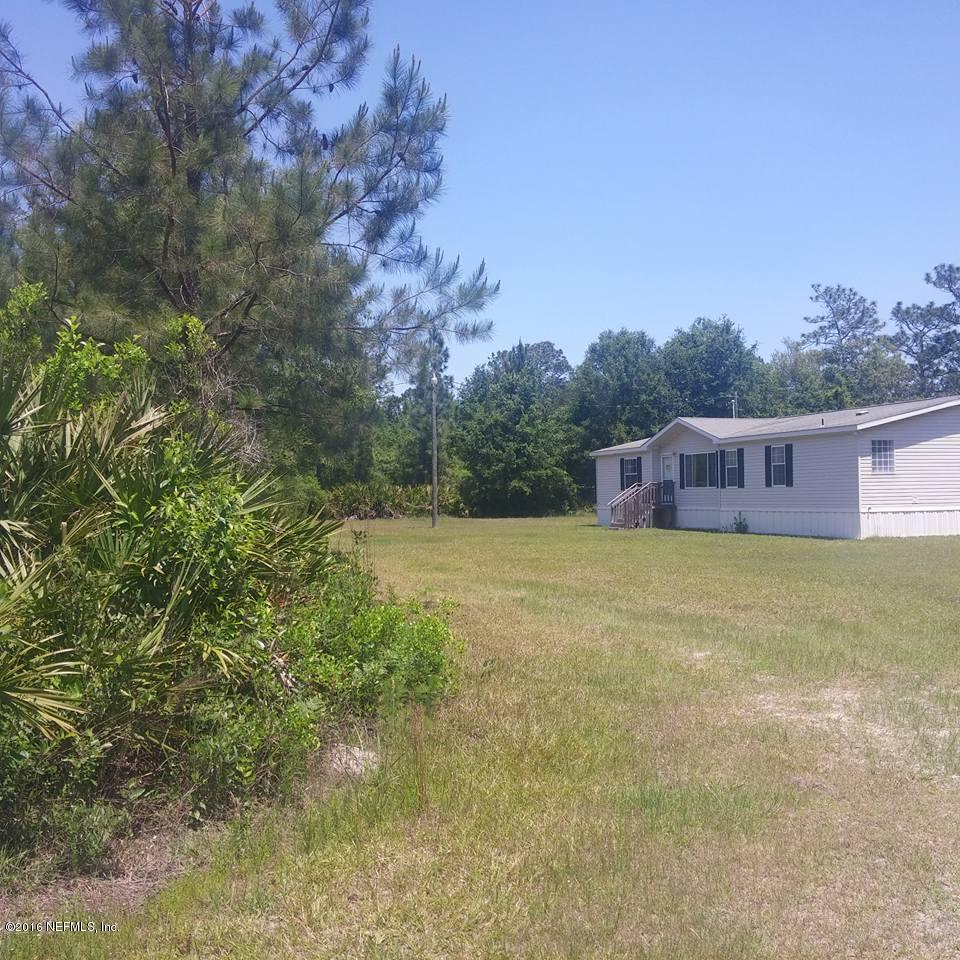 28749 Sundberg Road Hilliard, FL 32046 - Photo 2 of 38 driveway ent front yard
