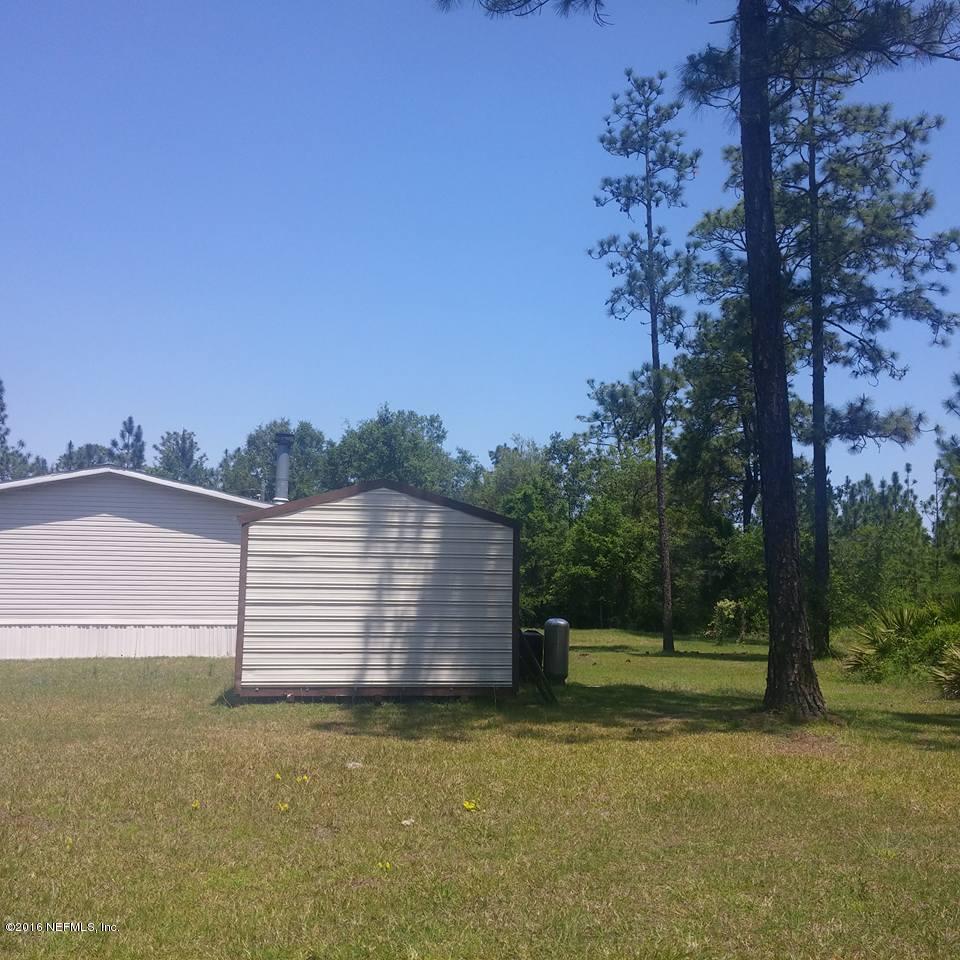 28749 Sundberg Road Hilliard, FL 32046 - Photo 8 of 38 ext side to back