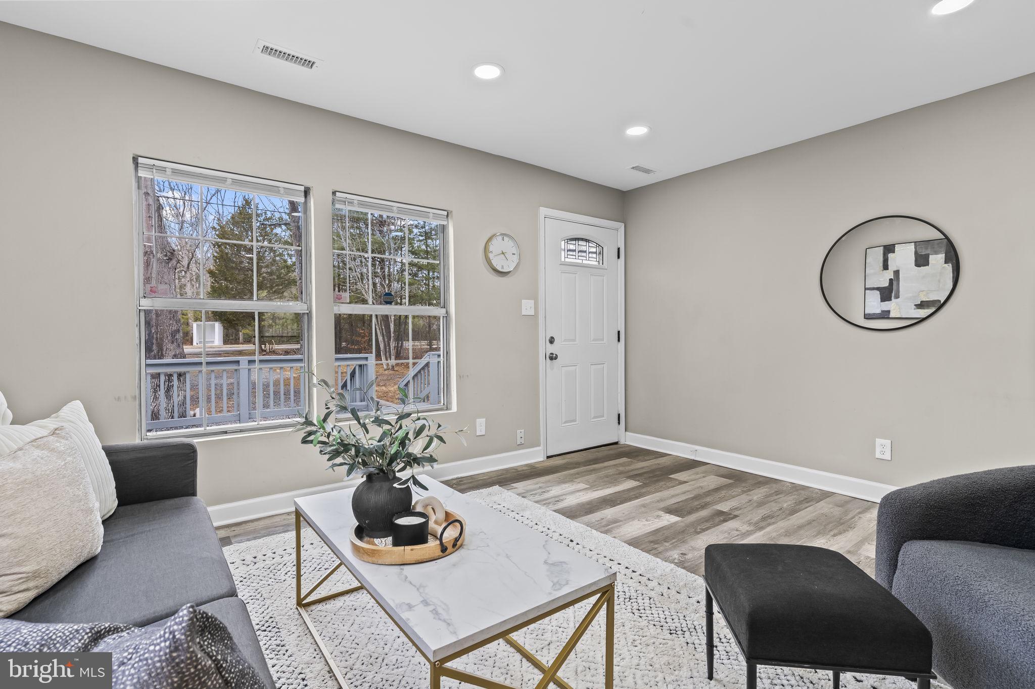 38461 Chaptico Road Mechanicsville, MD 20659 - Photo 15 of 35 a living room with furniture and window