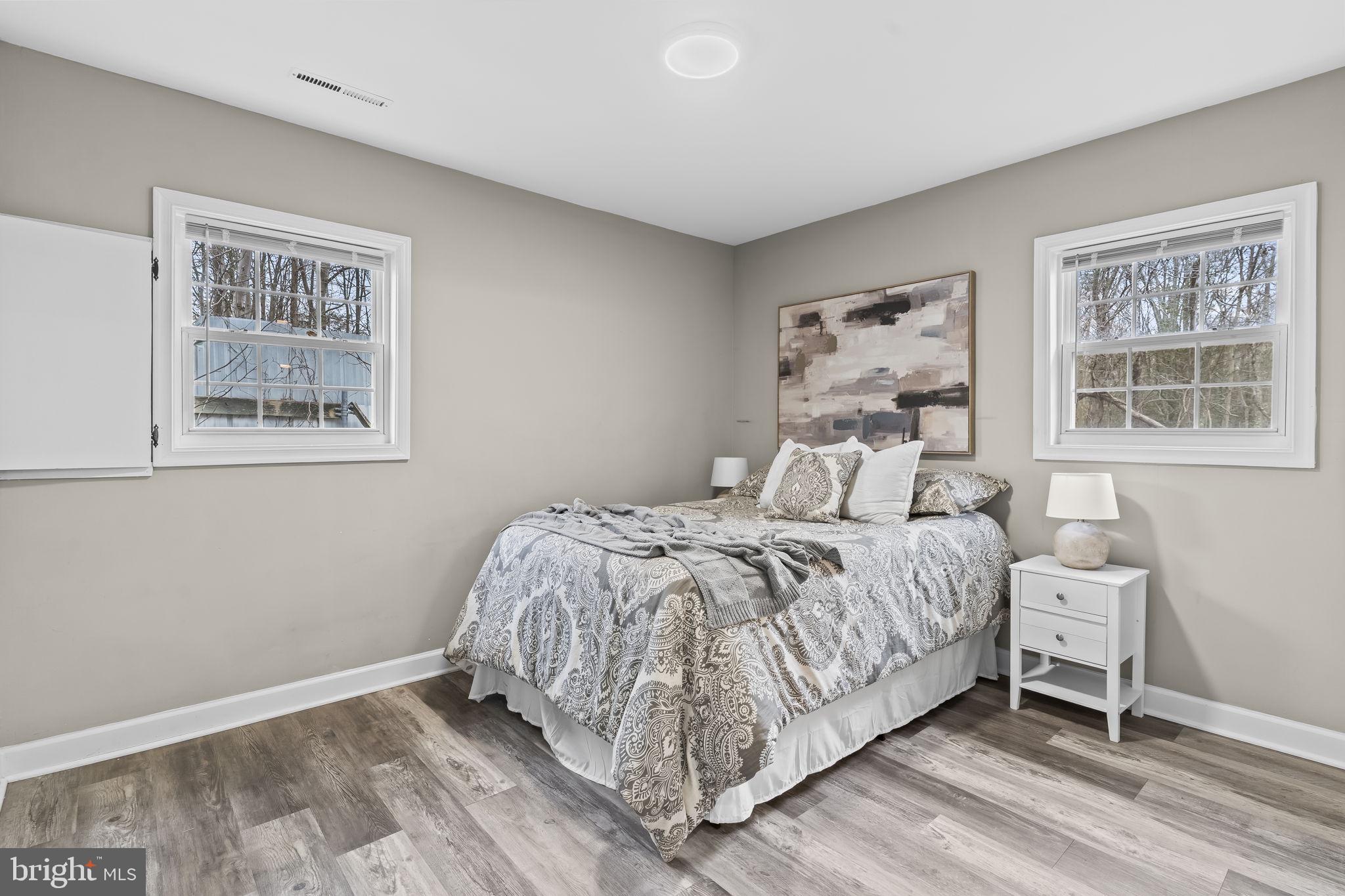 38461 Chaptico Road Mechanicsville, MD 20659 - Photo 18 of 35 a bedroom with a bed and a window