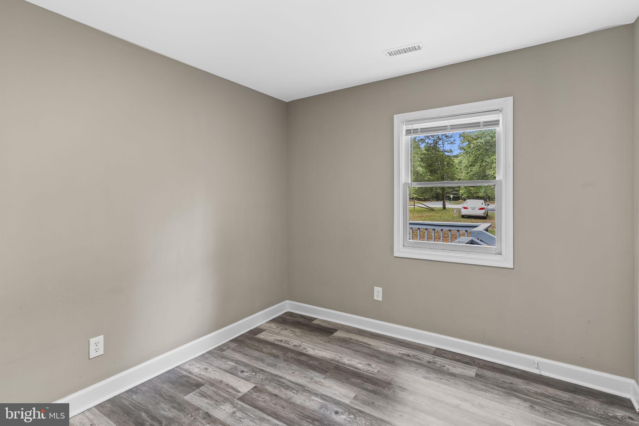 38461 Chaptico Road Mechanicsville, MD 20659 - Photo 22 of 35 a view of an empty room with a window