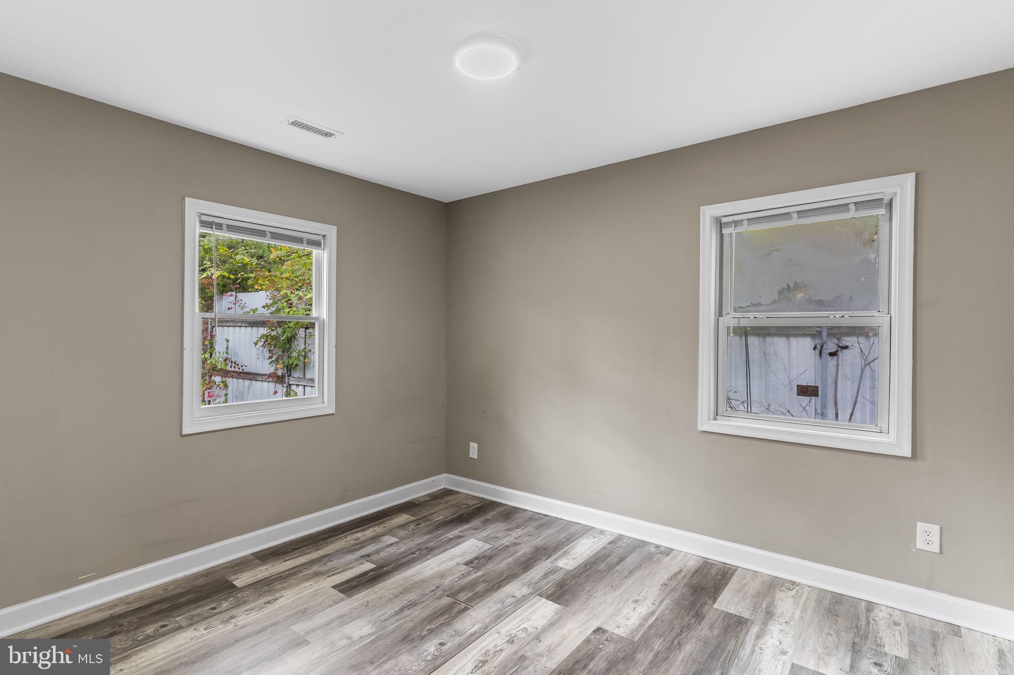 38461 Chaptico Road Mechanicsville, MD 20659 - Photo 24 of 35 a view of room with window and hardwood