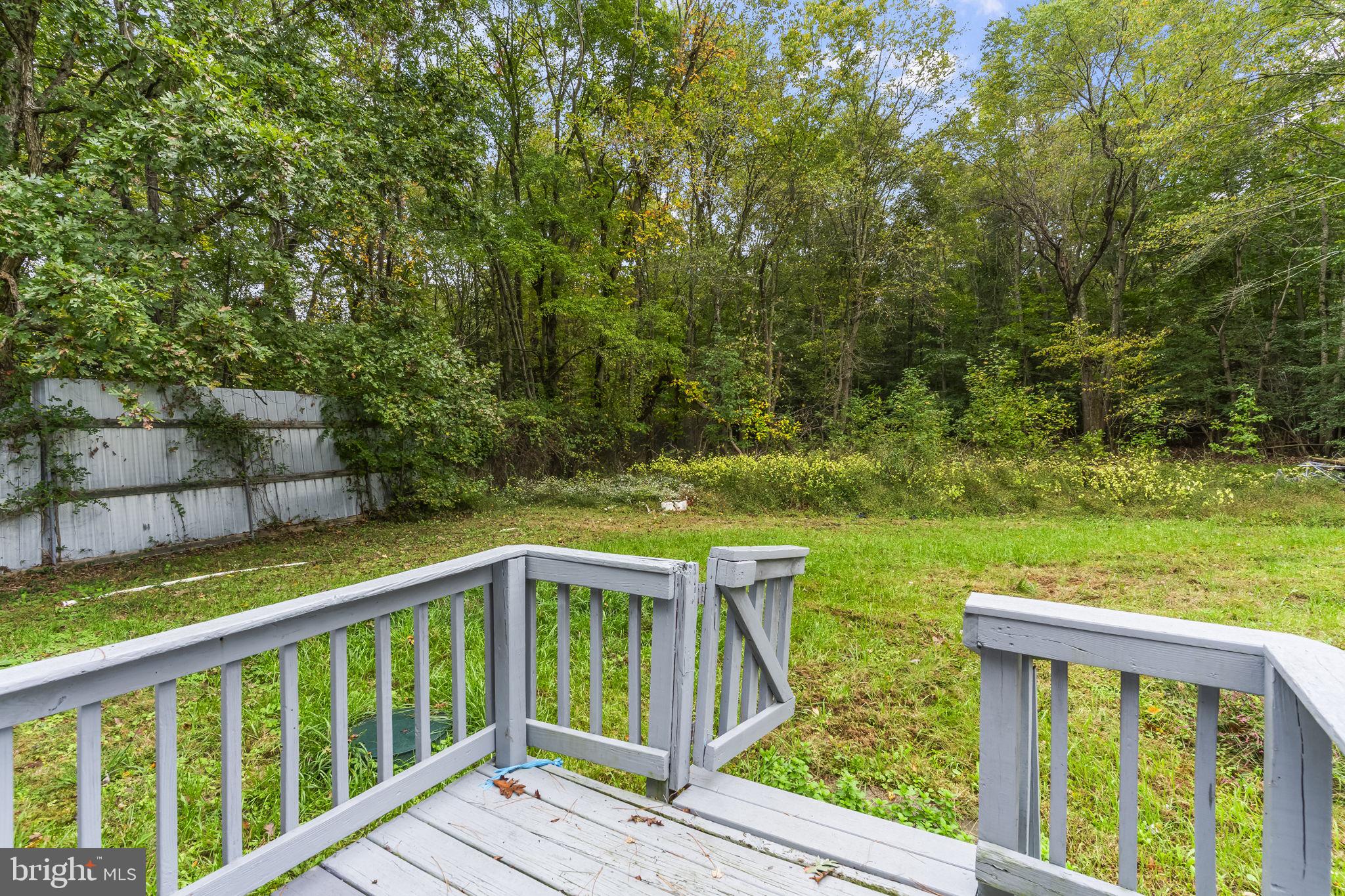 38461 Chaptico Road Mechanicsville, MD 20659 - Photo 28 of 35 a view of a two chairs in the deck