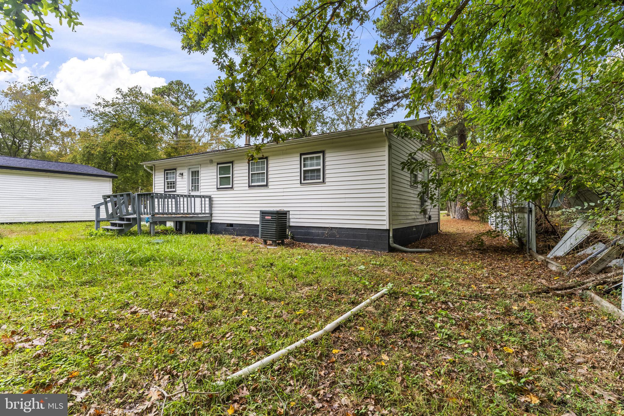 38461 Chaptico Road Mechanicsville, MD 20659 - Photo 30 of 35 a view of a house with a backyard