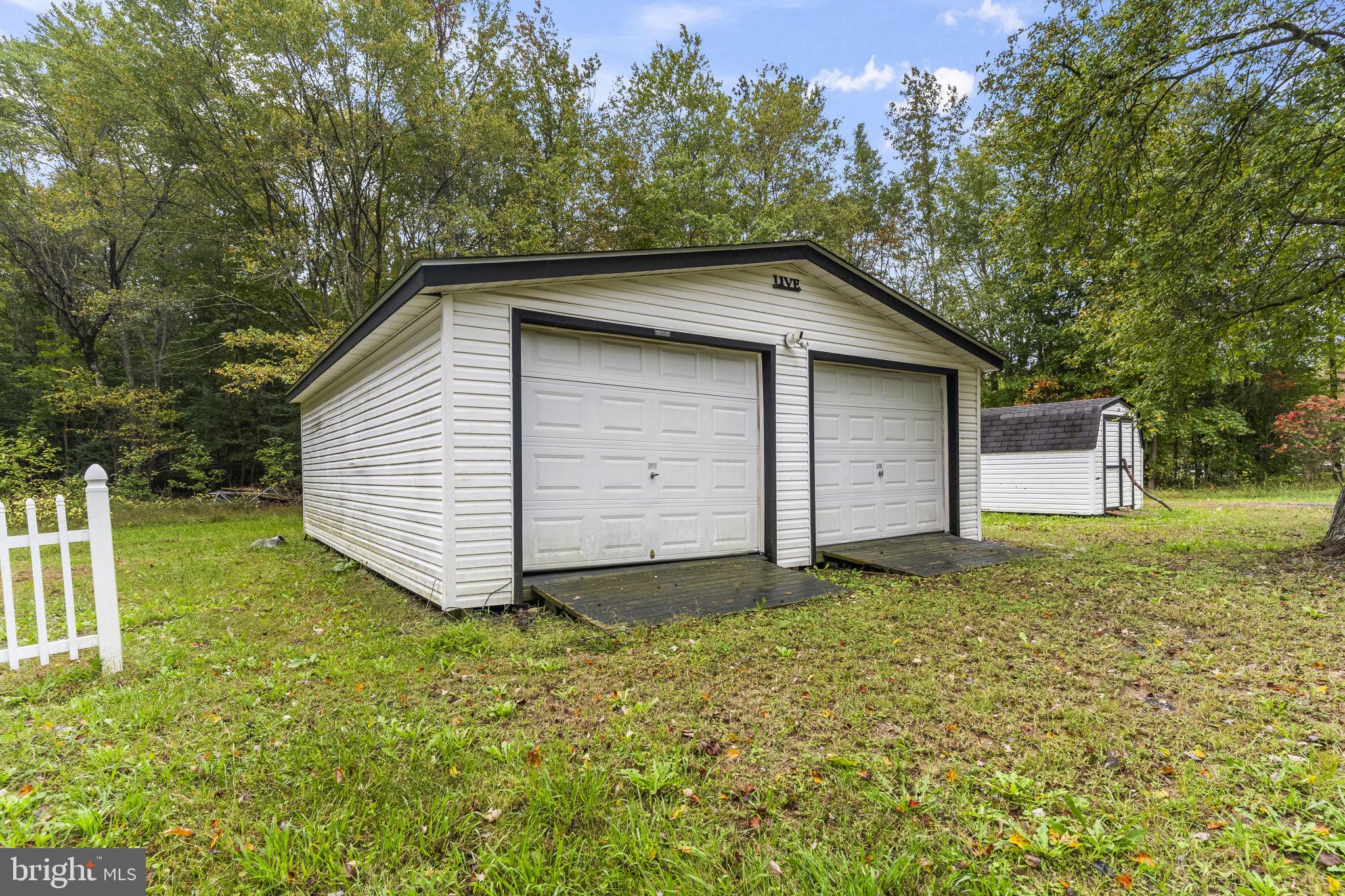 38461 Chaptico Road Mechanicsville, MD 20659 - Photo 32 of 35 a view of a house with a yard