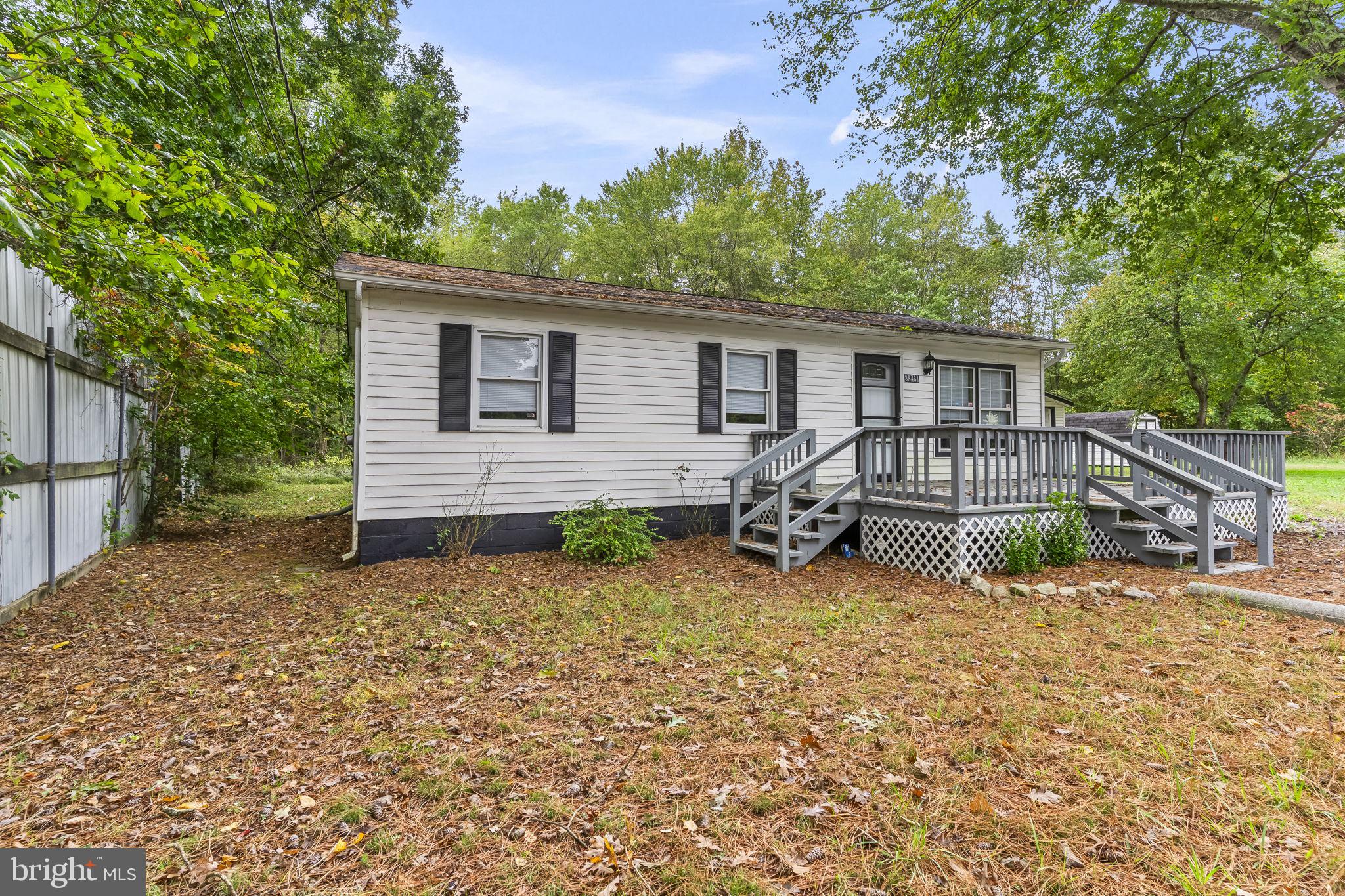 38461 Chaptico Road Mechanicsville, MD 20659 - Photo 4 of 35 a view of a house with a yard and wooden fence