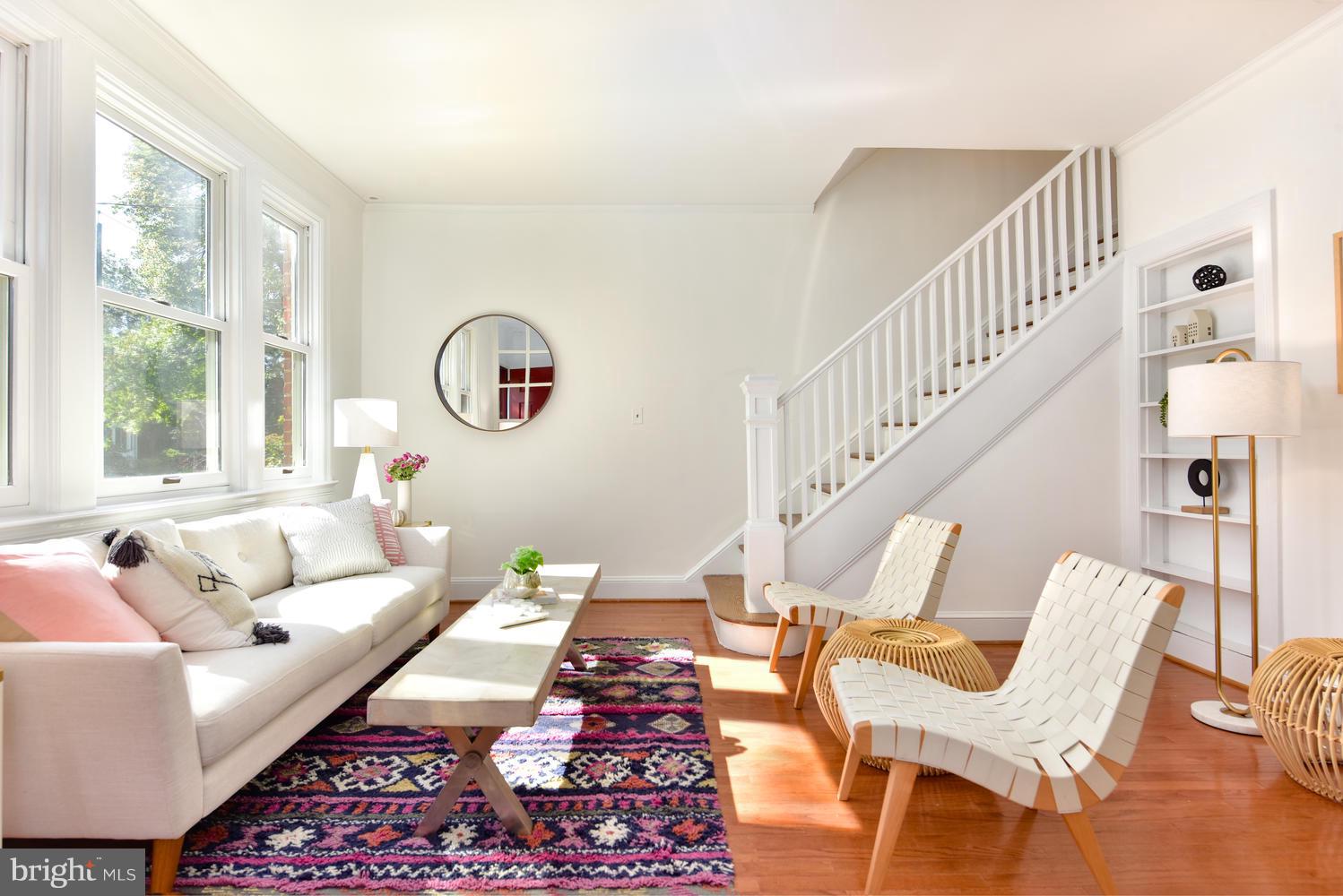 4427 Garrison Street Northwest Washington, DC 20016 - Photo 1 of 27 a living room with furniture or couch and a large window