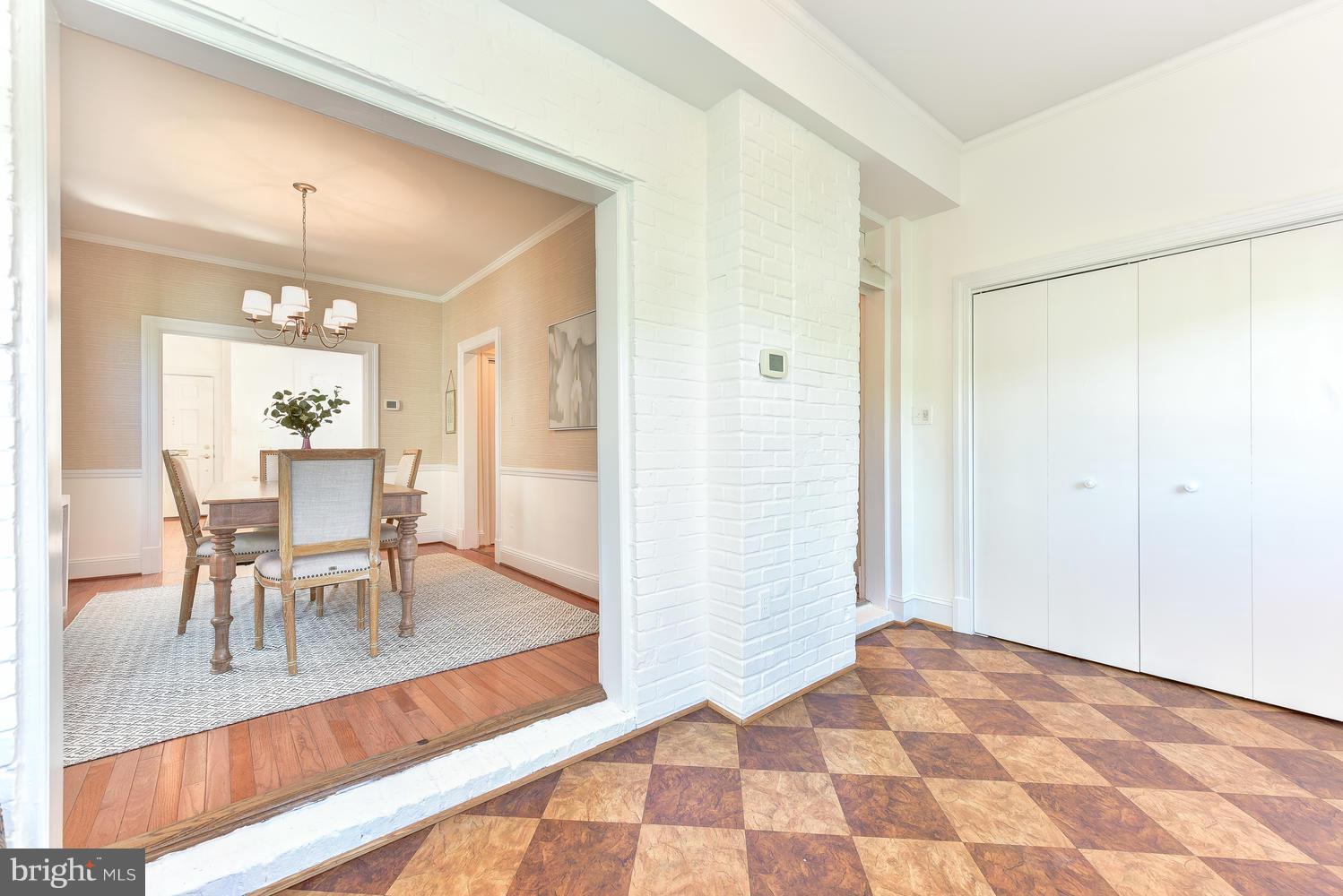 4427 Garrison Street Northwest Washington, DC 20016 - Photo 11 of 27 a view of a dining room with furniture and wooden floor