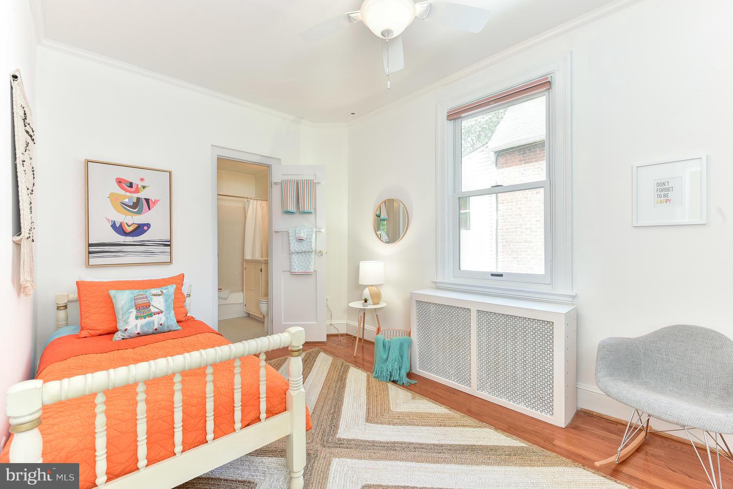 4427 Garrison Street Northwest Washington, DC 20016 - Photo 20 of 27 a bedroom with a bed and a window