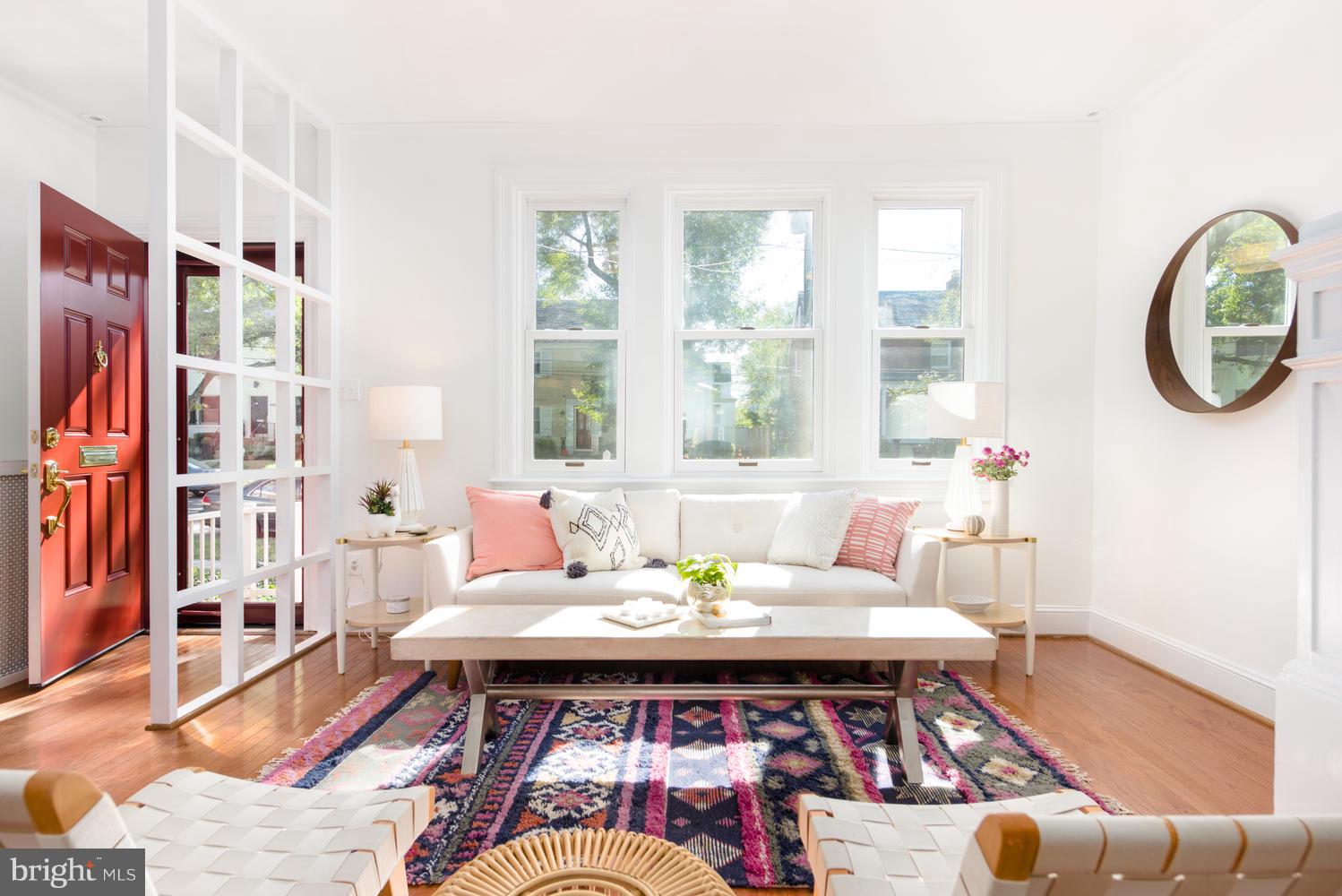 4427 Garrison Street Northwest Washington, DC 20016 - Photo 3 of 27 a living room with furniture and a large window