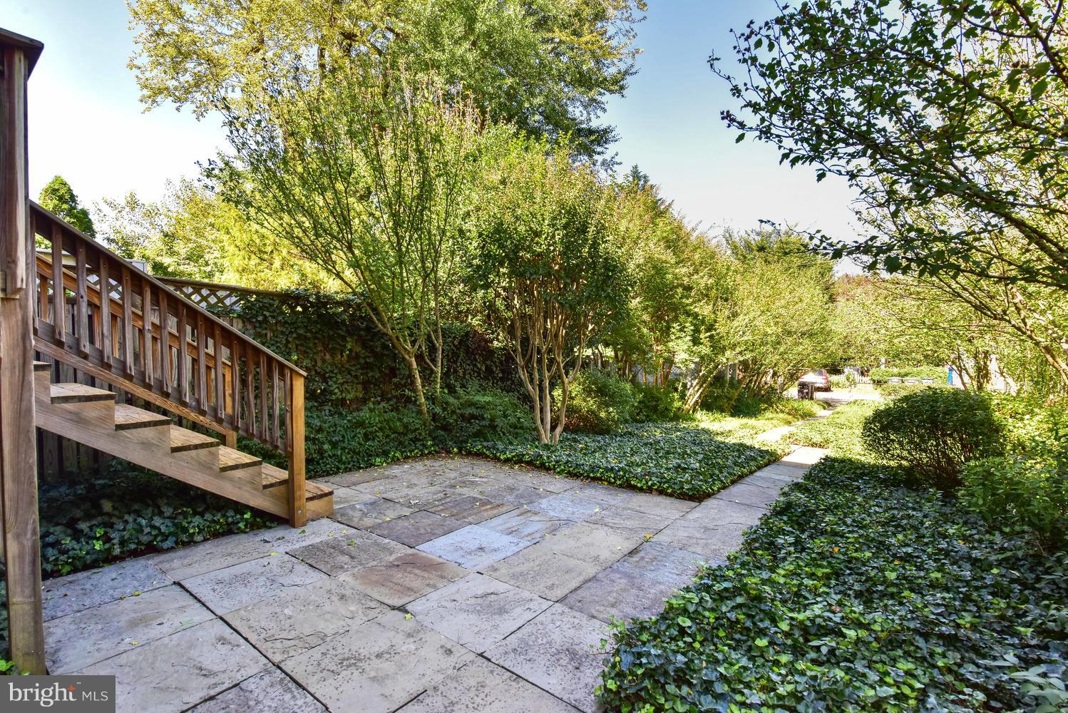 4427 Garrison Street Northwest Washington, DC 20016 - Photo 23 of 27 a view of a house with a yard