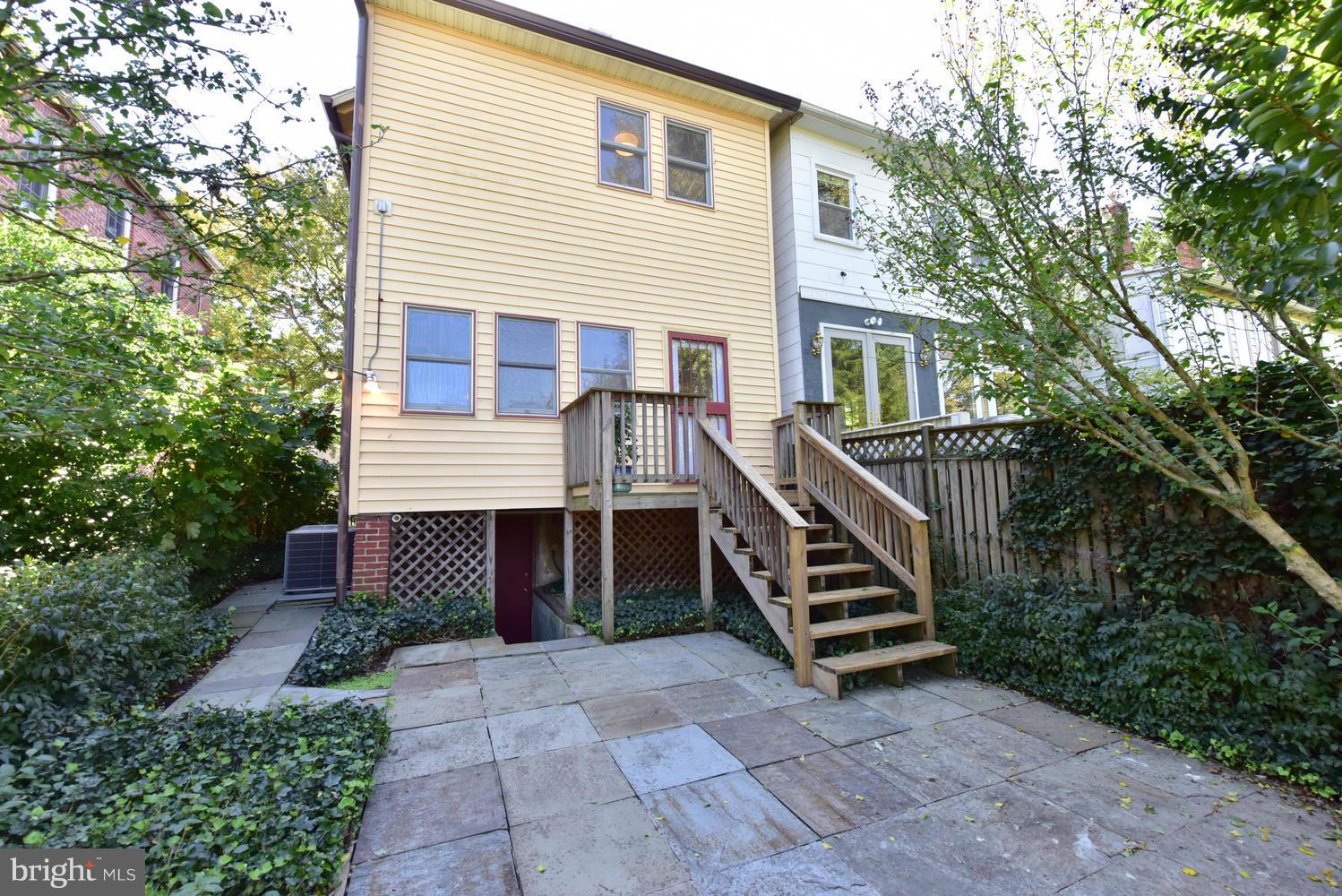 4427 Garrison Street Northwest Washington, DC 20016 - Photo 24 of 27 a front view of a house with stairs
