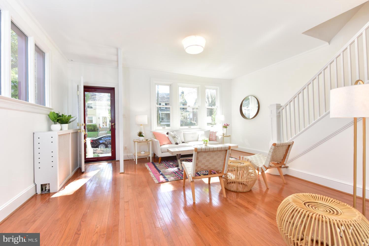 4427 Garrison Street Northwest Washington, DC 20016 - Photo 4 of 27 a living room with furniture and a wooden floor