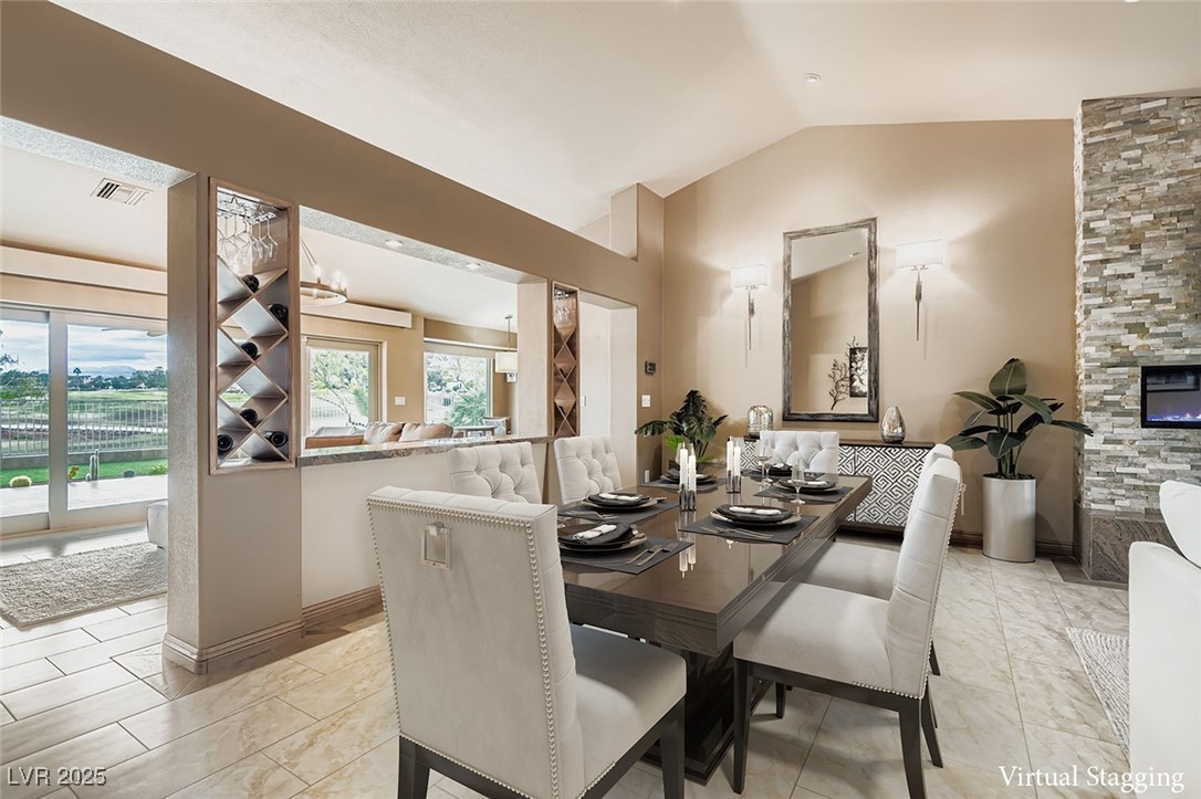 9101 Villa Ridge Drive Las Vegas, NV 89134 - Photo 8 of 39 Dinning room taable and chairs are virtually Staged