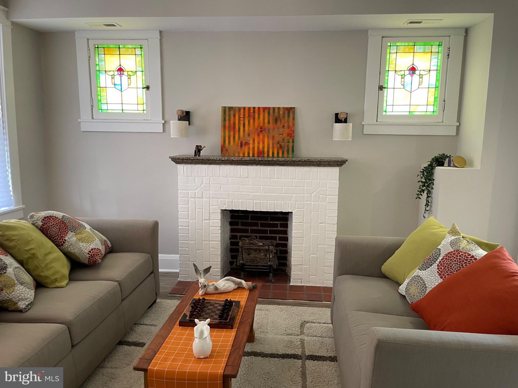 2301 Mosher Street Baltimore, MD 21216 - Photo 8 of 30 Charming living room with stained glass accents.