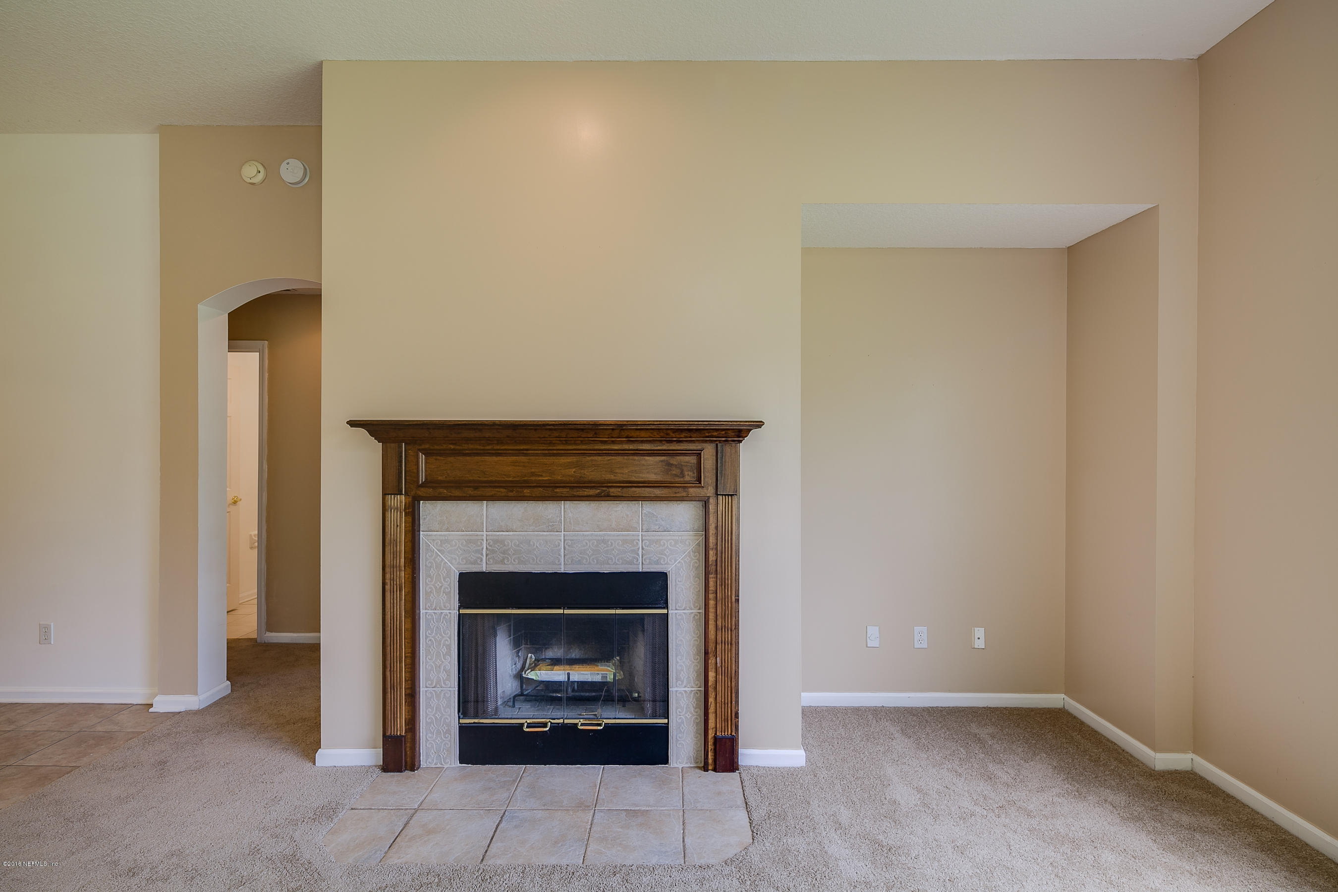 1727 Margarets Walk Road Fleming Island, FL 32003 - Photo 12 of 53 a room with a fireplace