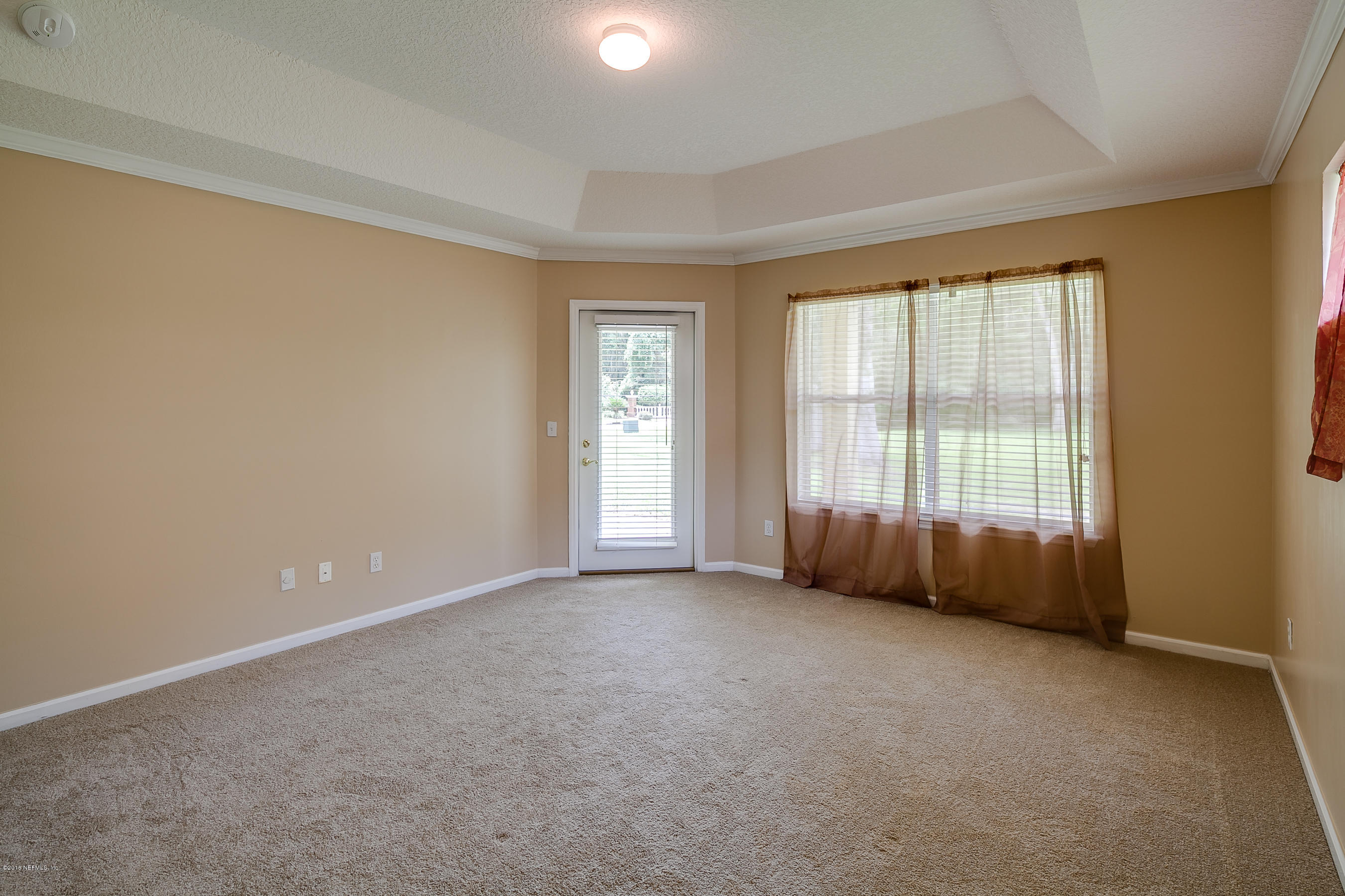 1727 Margarets Walk Road Fleming Island, FL 32003 - Photo 14 of 53 an empty room with windows