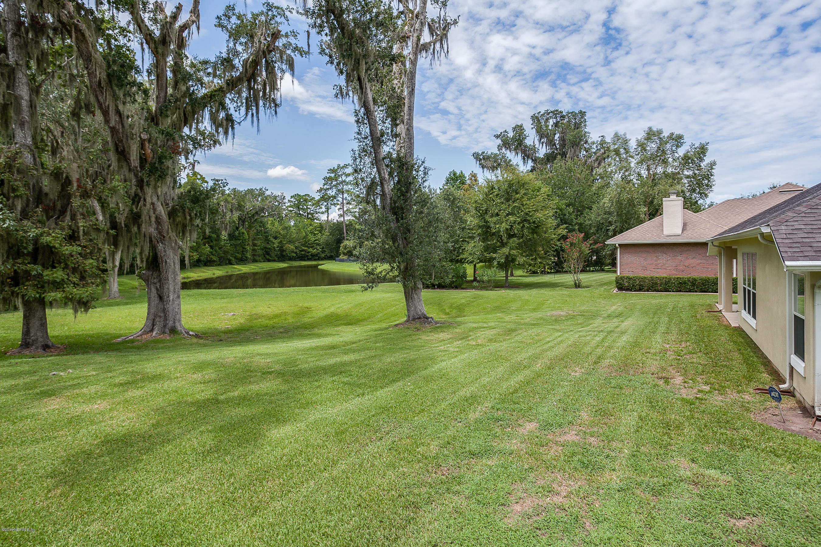 1727 Margarets Walk Road Fleming Island, FL 32003 - Photo 20 of 53 a view of a trees with a yard